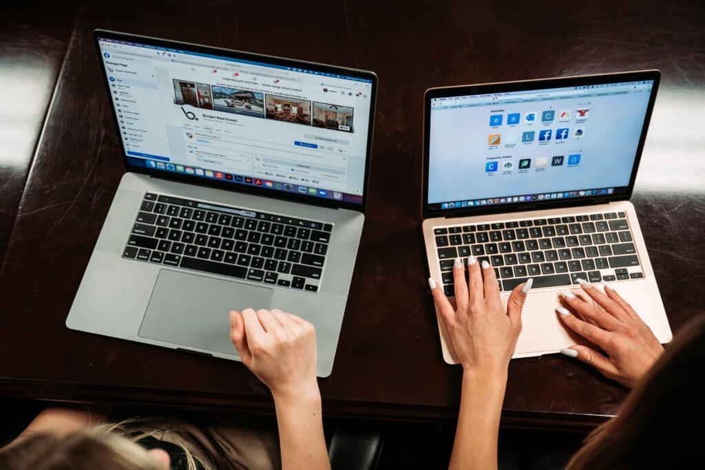 People using laptops, marketing team