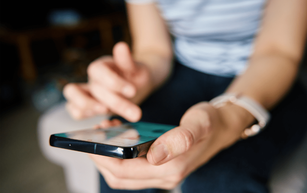 social media advertising, person using a phone